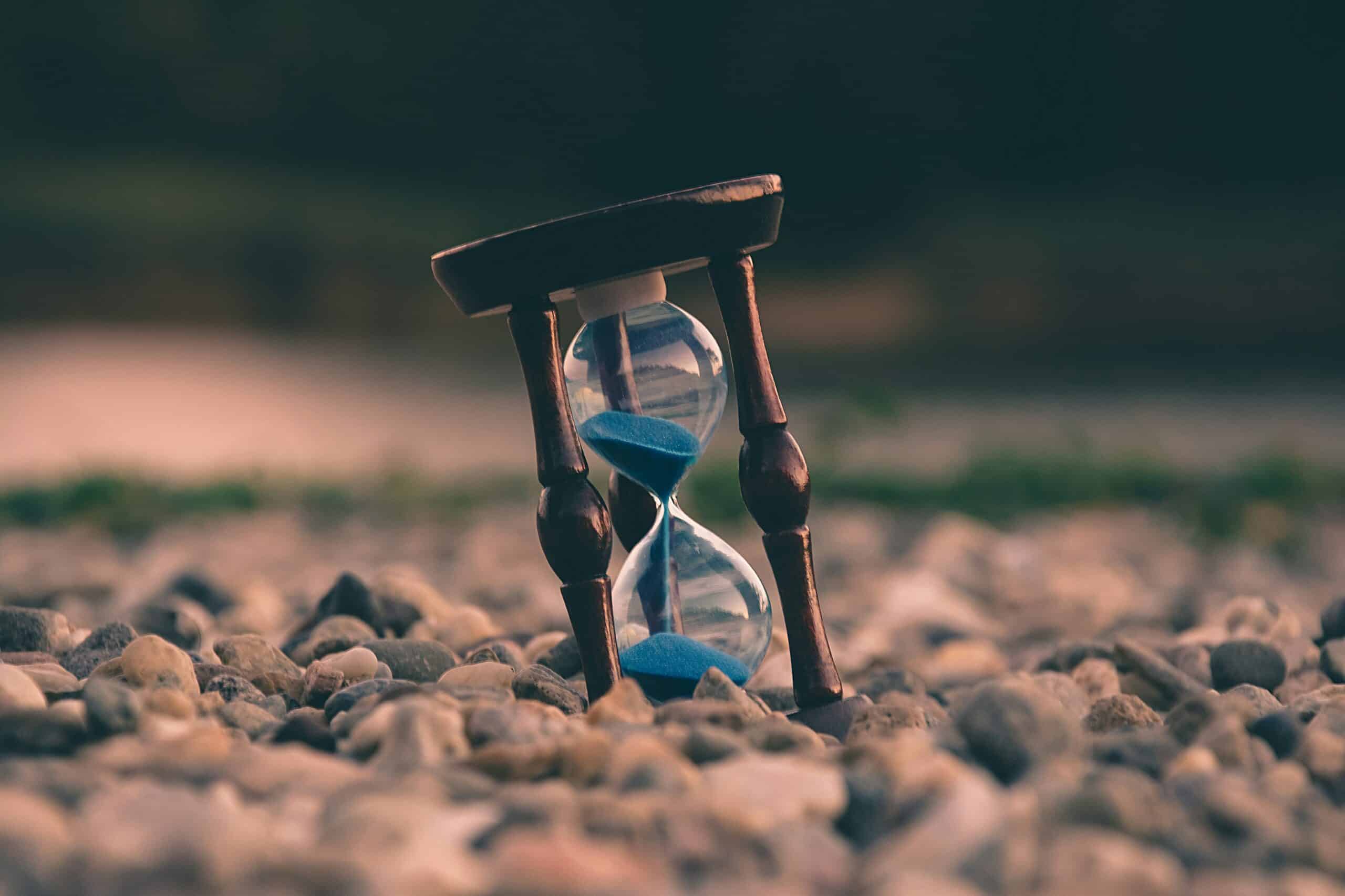 an hour glass running empty can be fixed because money gives you time back