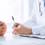 ER doctor and patient talking, illustrating that doctors are very smart and also need to learn personal finance education on Think and Talk Money.