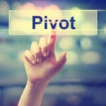 Pivot concept with hand illustrating the ability to choose what comes next with Financial Independence, Pivot Early.
