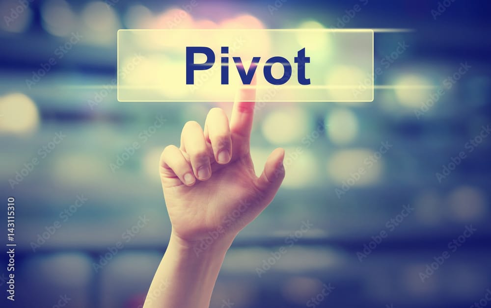 Pivot concept with hand illustrating the ability to choose what comes next with Financial Independence, Pivot Early.