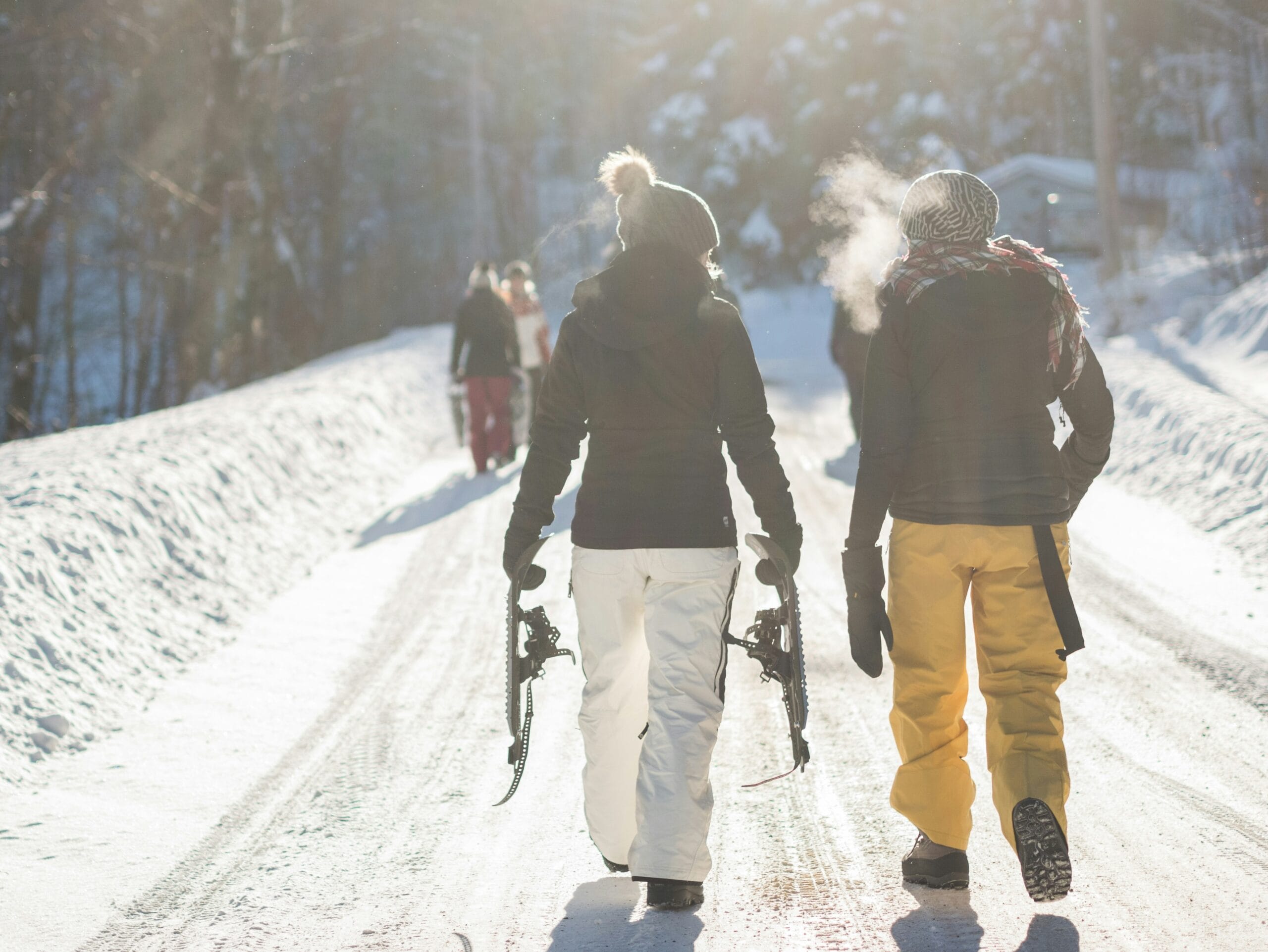 Snowboarders breath on a cold day illustrating the power of financial independence earned through house hacking.