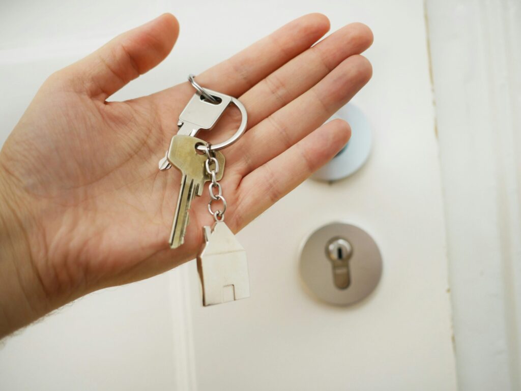 door key symbolizing how investing in real estate can accelerate your journey to financial freedom.