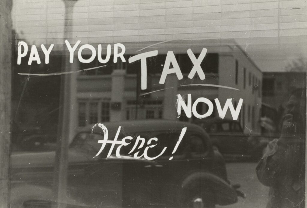 Sign, Harlingen, Texas.
1939, but if you have real estate, you may not pay any taxes at all on your cash flow. Photographer Lee Russell 
