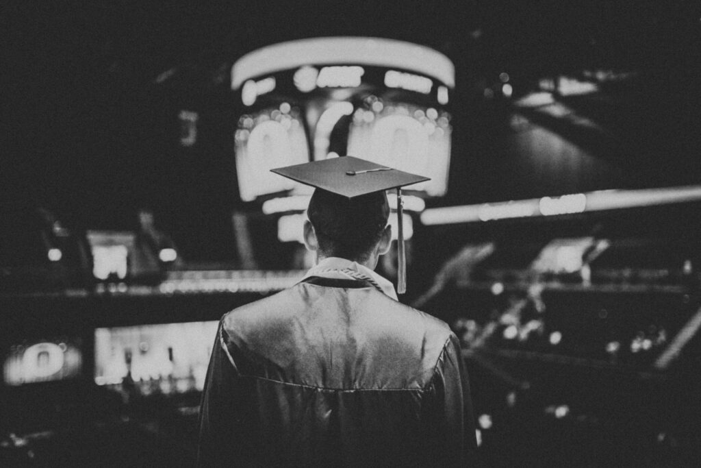 picture of student graduating illustrating that Recent law graduates: continue living like a law student.