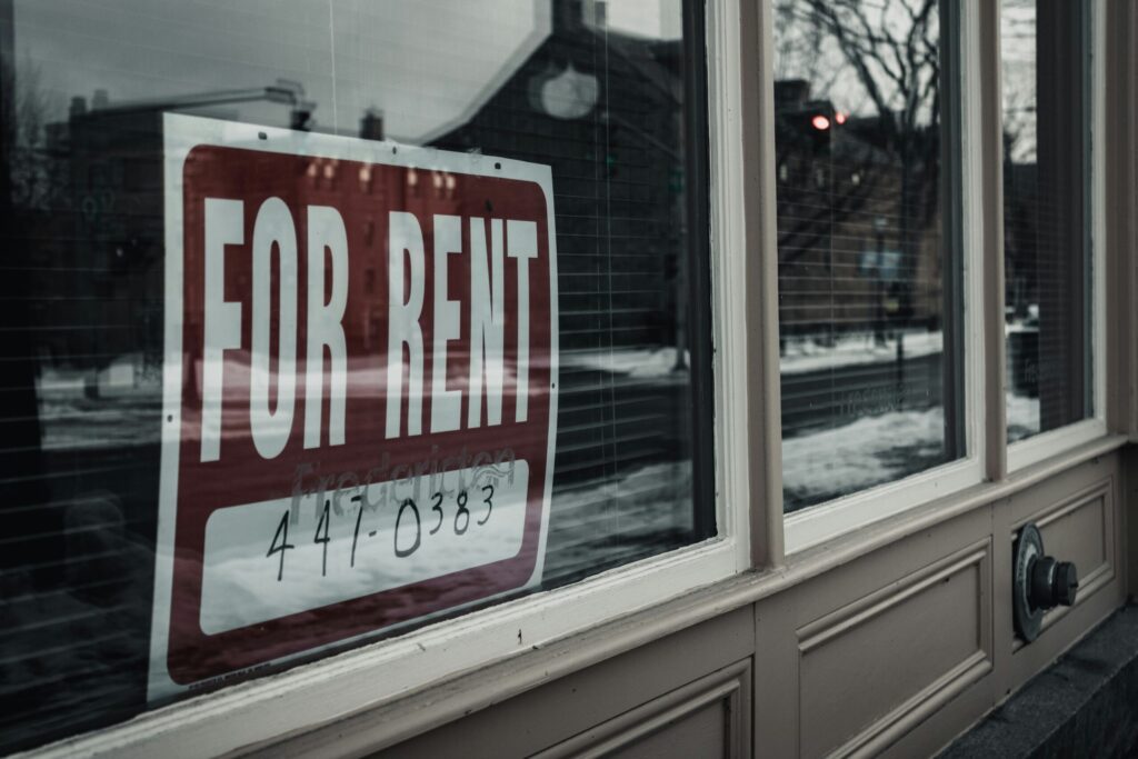 for rent sign in window reflecting that all rental property investors need other know their why before they start buying.