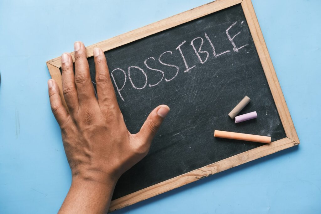 a chalkboard with the word possible written on it showing what's possible with the 4.7% Rule.
