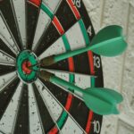 Dart arrow on red dot point showing the key to using the 4.7% Rule to plan for retirement.