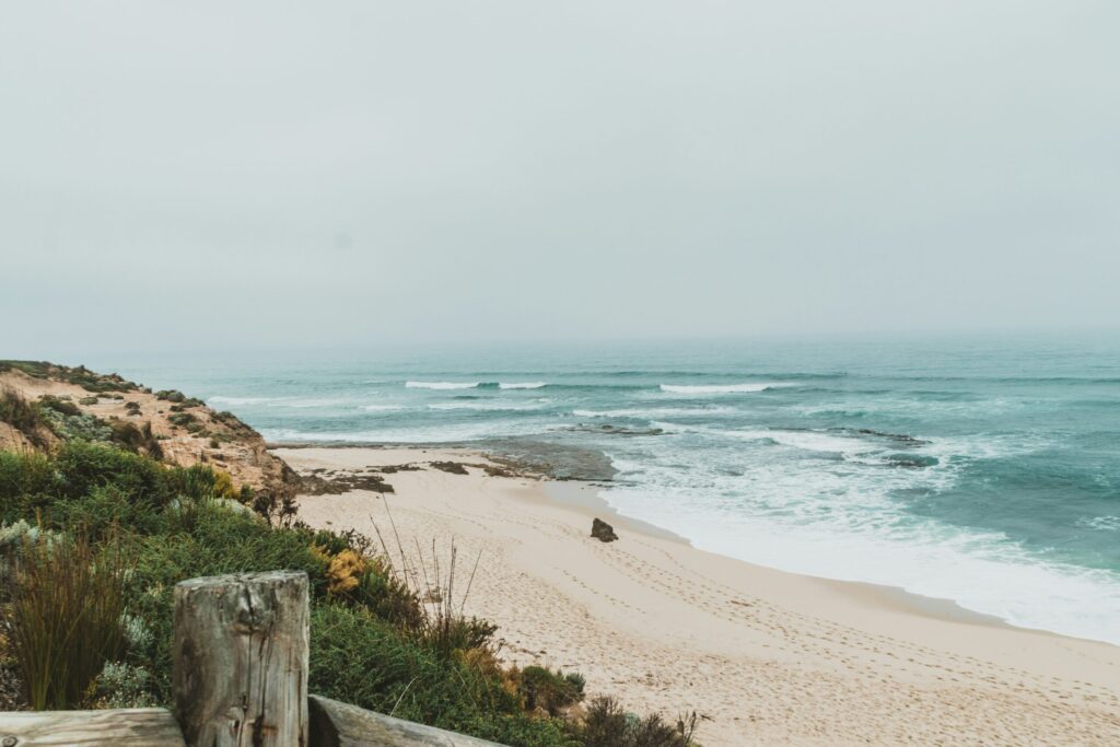 seashore during daytime showing the money mindset hack of Coast FIRE.