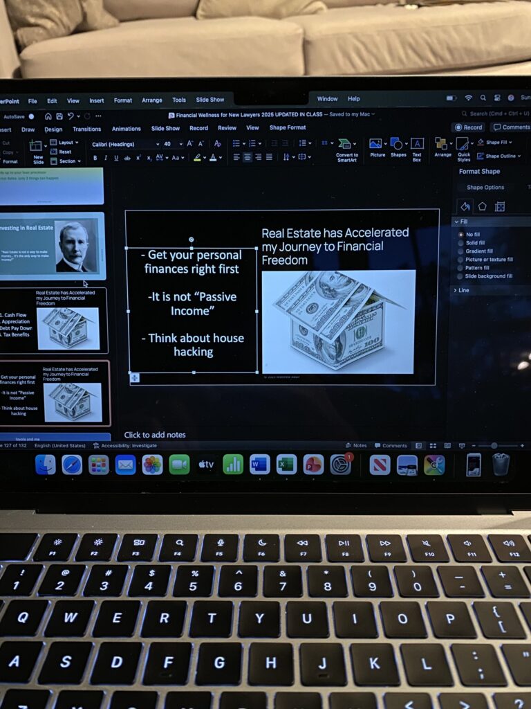 Matthew Adair preparing slides for a personal finance seminar for law students and lawyers showing that after completing another personal finance seminar with a great group of law students, I feel energized to use my money as a tool to build a life I'm proud of.