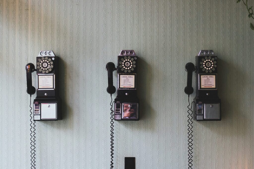 vintage telephone on the wall reflecting the triple tax advantages of Health Savings Accounts (HSA).