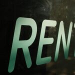 Rent sign representing my step-by-step guide to finding your first rental property.