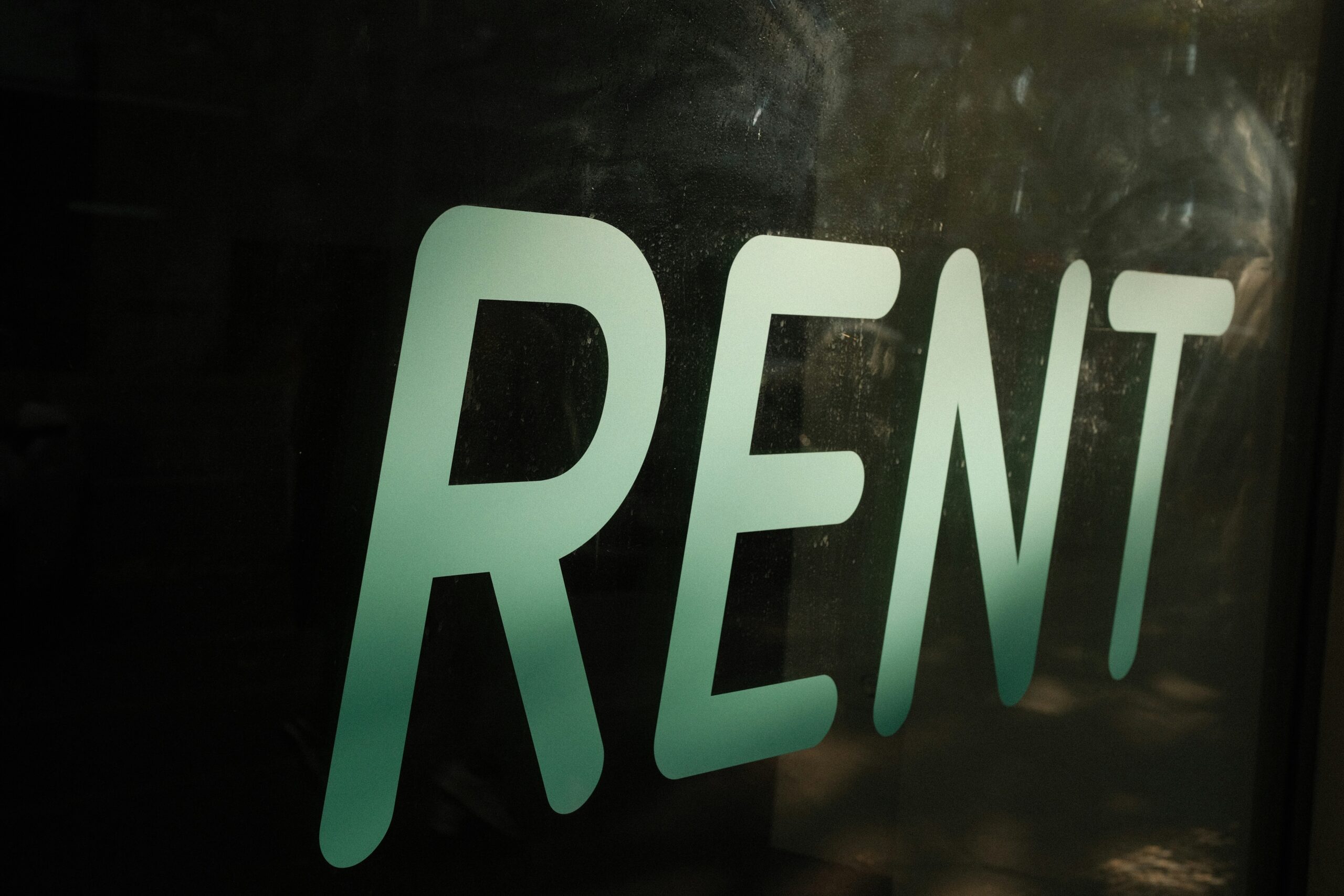 Rent sign representing my step-by-step guide to finding your first rental property.