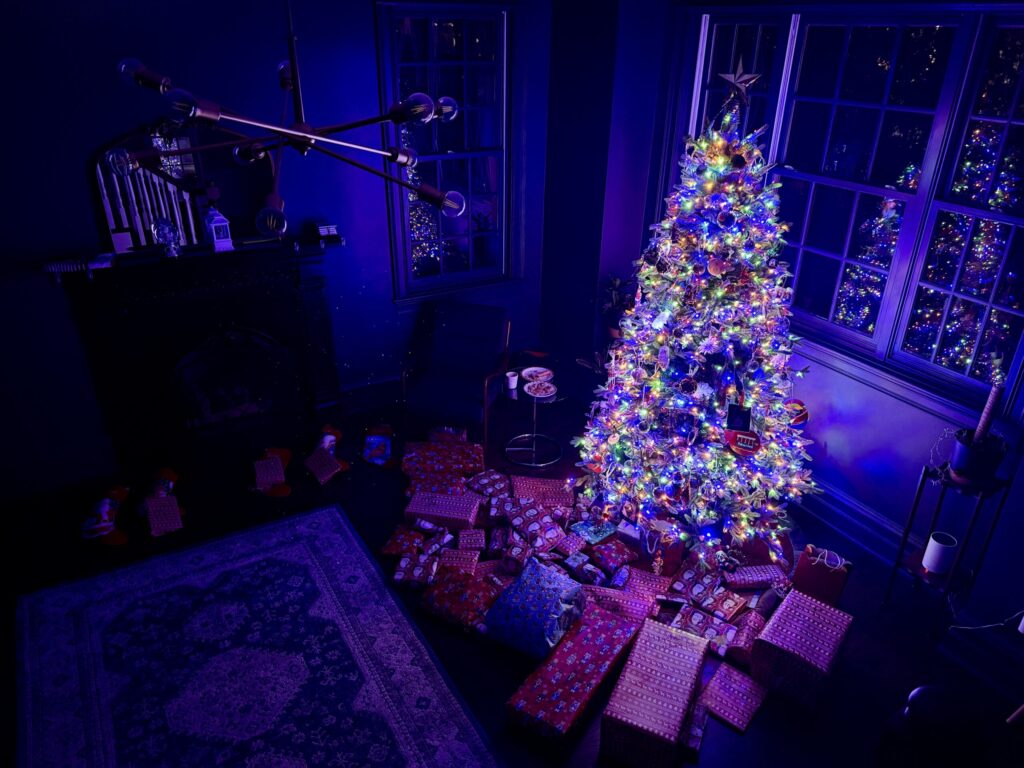 Christmas tree and presents reflecting some self-evaluation followed by thoughtful adjustments, which is the backbone of his Budget After Thinking system.