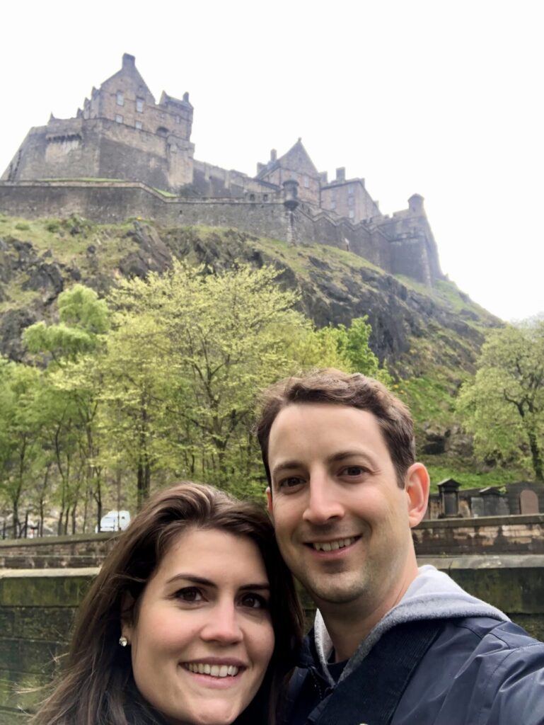 Matthew Adair, founder of think and talk money in front of Edinburgh castle symbolizing how we should think about our money and protecting what we have