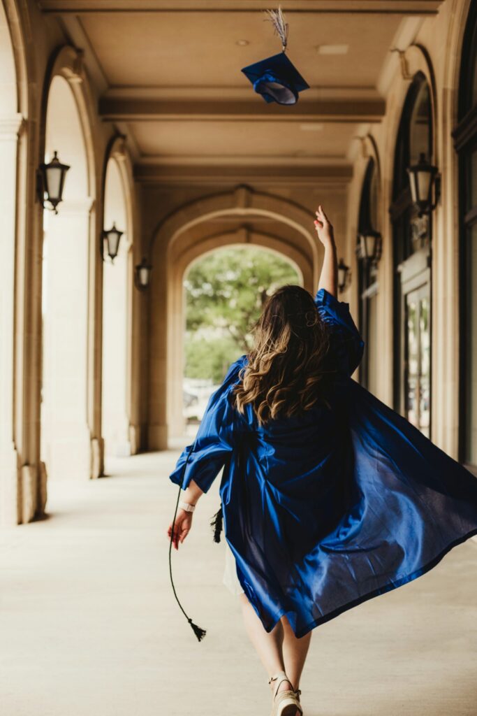 picture of student graduating illustrating that Recent law graduates: continue living like a law student.